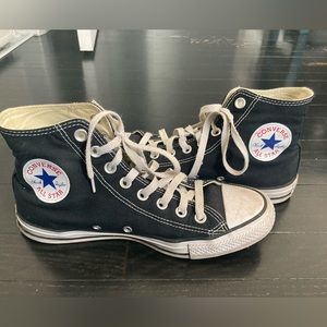 Black high top converse. Unisex: size 9 women, size 7 men.